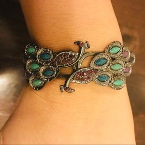 Silver peacock hinge cuff bracelet worn 1x